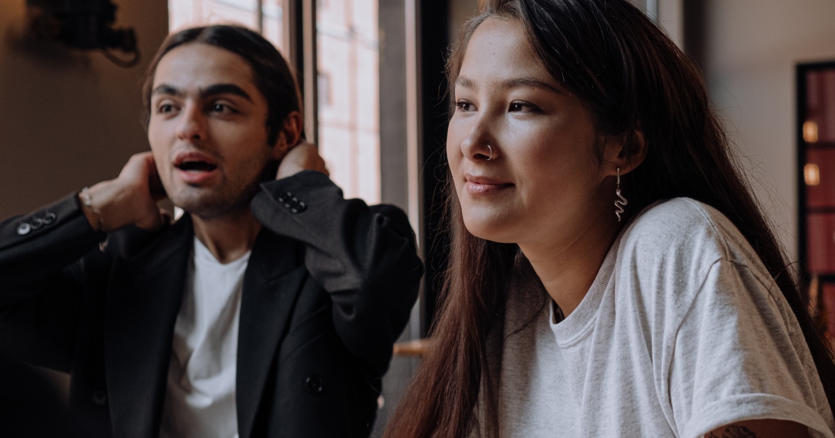 Two people engaged in discussion